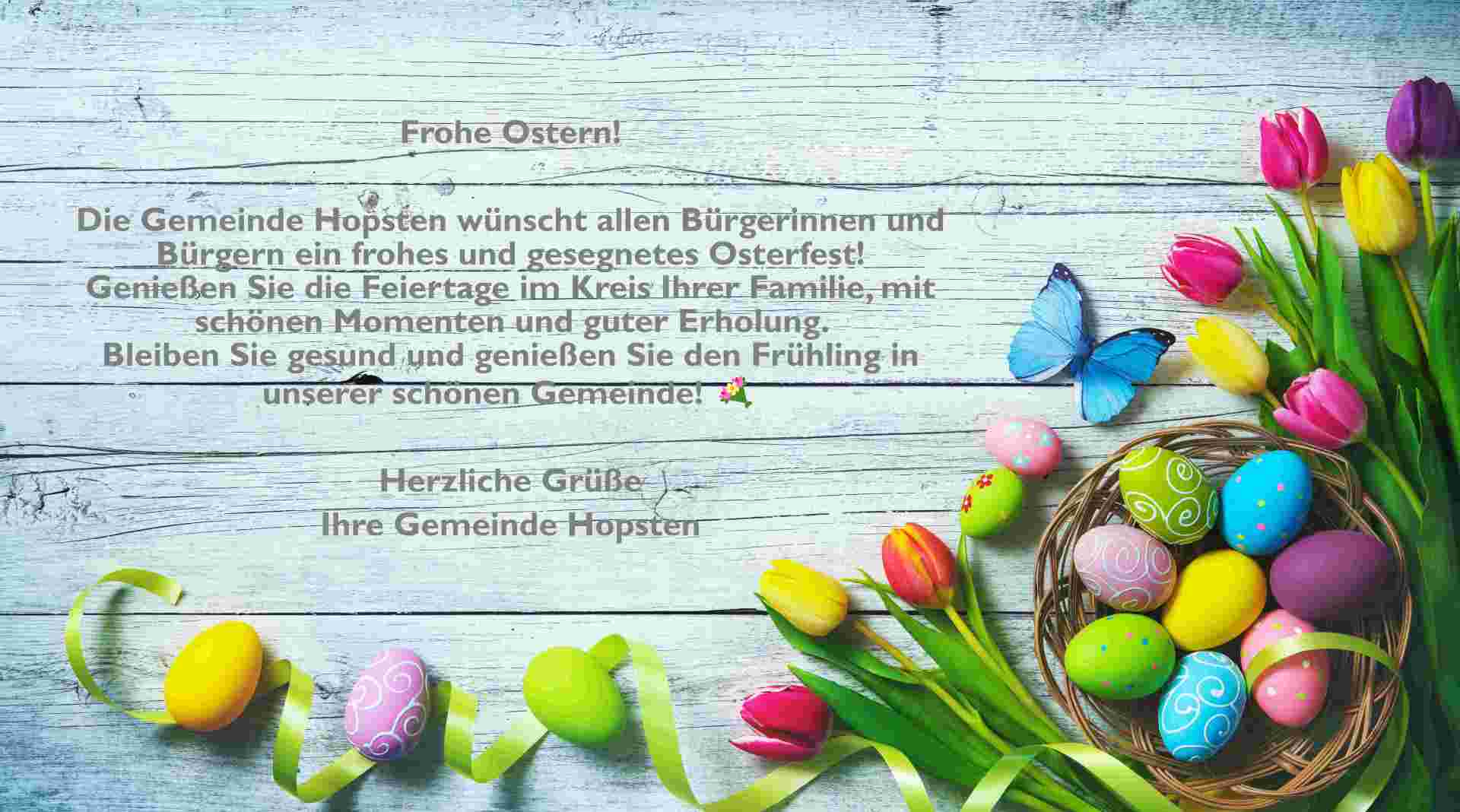 Easter background. Colorful spring tulips with butterflies and p