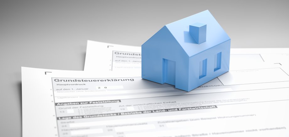 German property tax ("Grundsteuer") concept. A house on the form for the declaration of the tax.